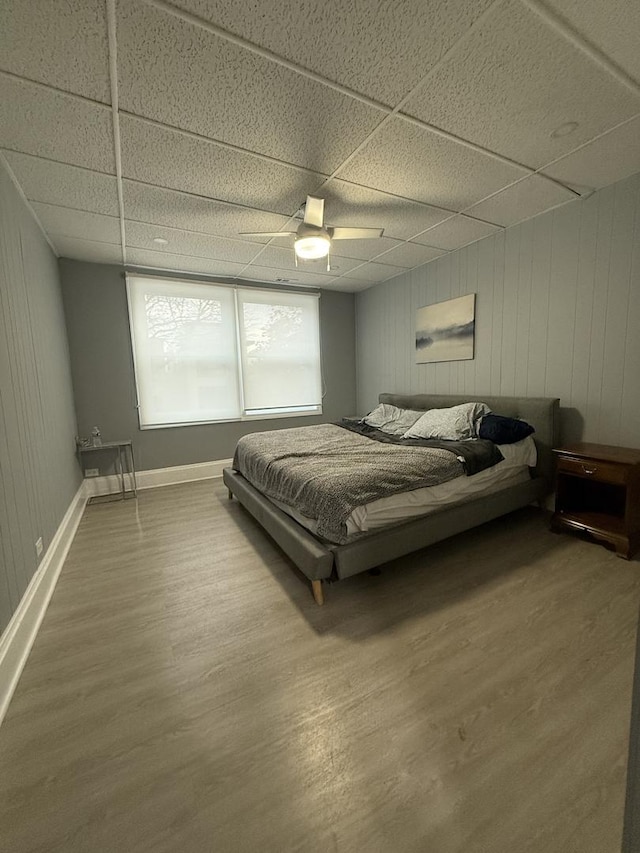 1812 W Erie St, Chicago, IL 60622 - bedroom with ceiling fan, a drop ceiling, and wood finished floors
