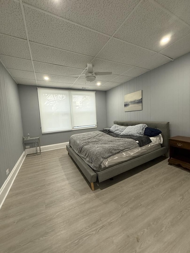 1812 W Erie St, Chicago, IL 60622 - bedroom with wood finished floors, ceiling fan, baseboards, and a drop ceiling