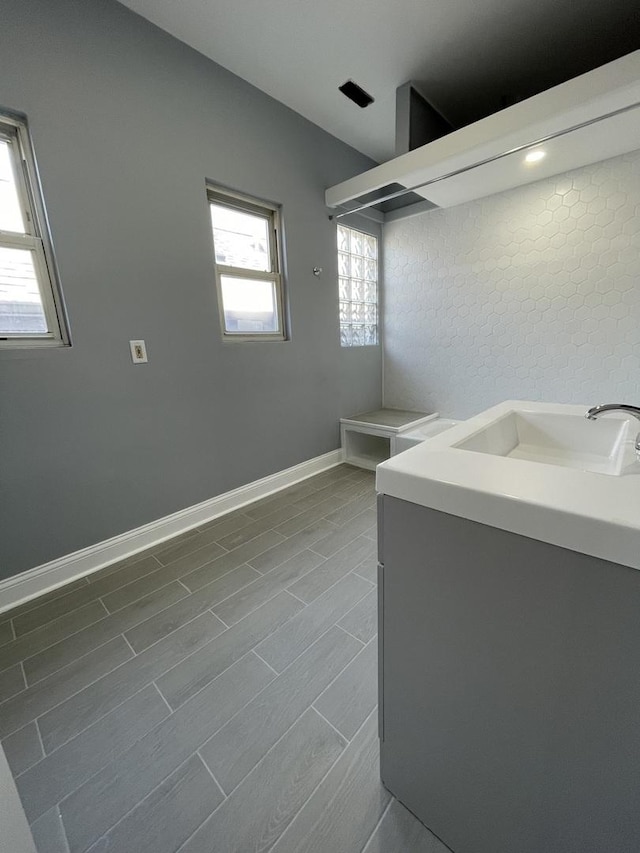1812 W Erie St, Chicago, IL 60622 - interior space featuring baseboards, wood finish floors, and vanity