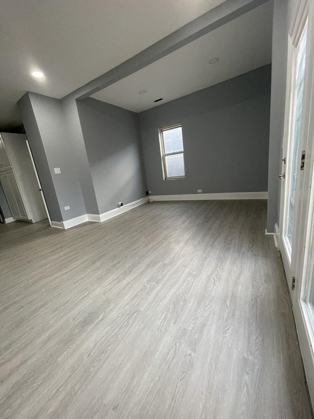 1812 W Erie St, Chicago, IL 60622 - unfurnished room featuring baseboards and wood finished floors
