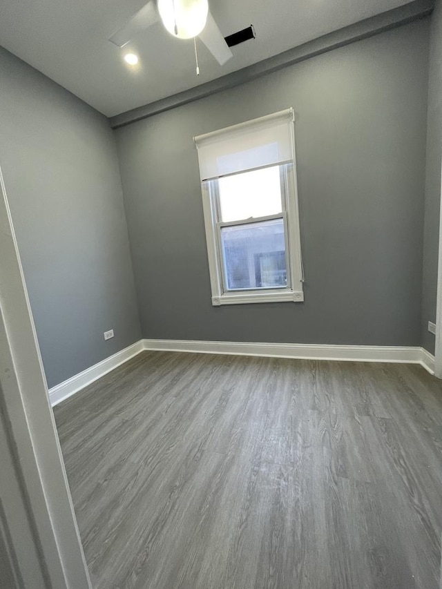 1812 W Erie St, Chicago, IL 60622 - unfurnished room with wood finished floors, ceiling fan, and baseboards