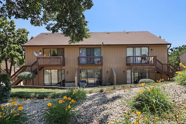 41 Bermuda Colony Unit 5, Fox Lake, IL 60020 - back of house with stairway and a shingled roof
