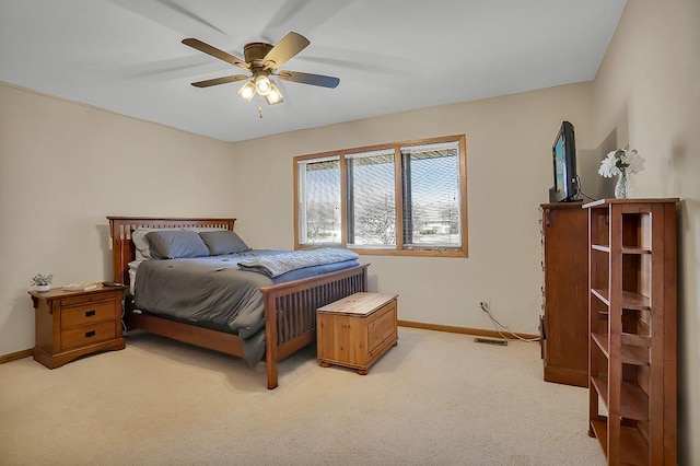 18148 Vermont Ct Unit 243, Orland Park, IL 60467 - bedroom featuring baseboards, light carpet, and ceiling fan