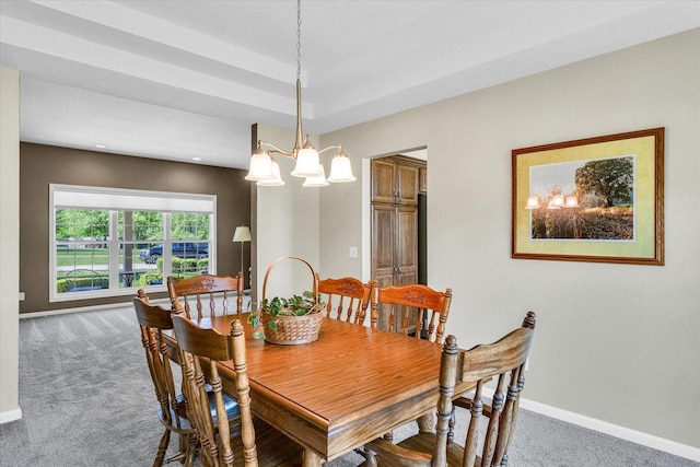 1310 Kimela Dr, Mahomet, IL 61853 - carpeted dining space featuring a chandelier, baseboards, and recessed lighting