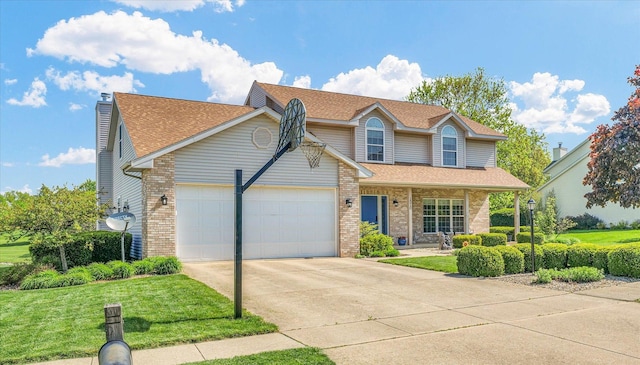 1310 Kimela Dr, Mahomet, IL 61853 - traditional home with an attached garage, brick siding, driveway, and a front yard