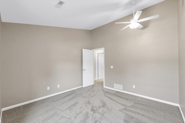 1310 Kimela Dr, Mahomet, IL 61853 - unfurnished room with ceiling fan, carpet floors, baseboards, and high vaulted ceiling