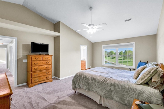 1310 Kimela Dr, Mahomet, IL 61853 - bedroom with vaulted ceiling, carpet, baseboards, and ensuite bath