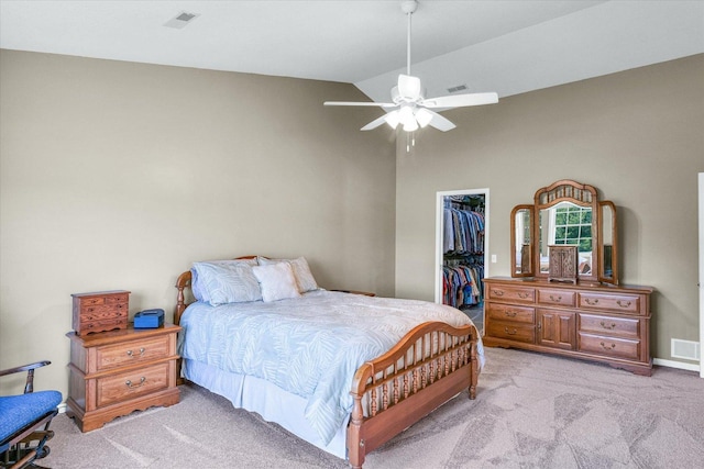 1310 Kimela Dr, Mahomet, IL 61853 - bedroom with light colored carpet, a spacious closet, a closet, ceiling fan, and high vaulted ceiling