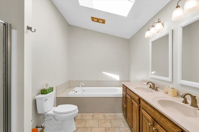 1310 Kimela Dr, Mahomet, IL 61853 - full bathroom with a skylight, toilet, a bath, and double vanity