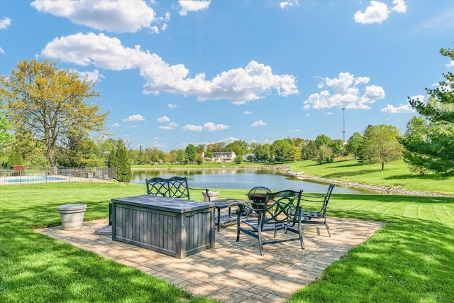 1310 Kimela Dr, Mahomet, IL 61853 - view of patio / terrace featuring a water view and view of wooded area