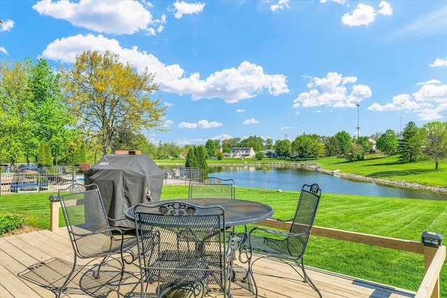1310 Kimela Dr, Mahomet, IL 61853 - wooden deck with a water view, view of wooded area, a grill, and outdoor dining area