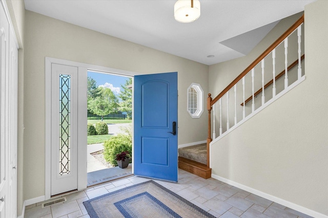 1310 Kimela Dr, Mahomet, IL 61853 - entryway with baseboards and stairway