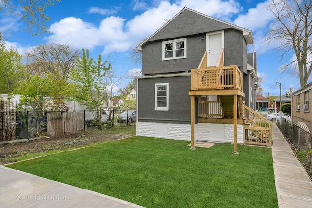 2017 W 68th St, Chicago, IL 60636 - back of property with stucco siding and stairway