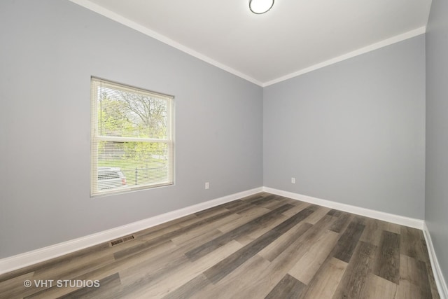 2017 W 68th St, Chicago, IL 60636 - empty room with baseboards, dark wood finished floors, and ornamental molding