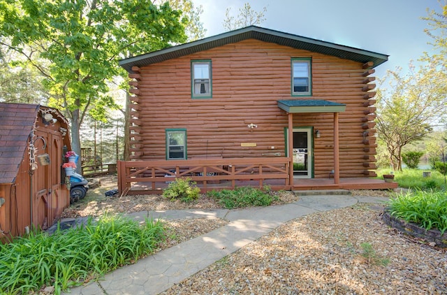 64 Big Musky Circle Ln, Wilmington, IL 60481 - view of front facade featuring log siding