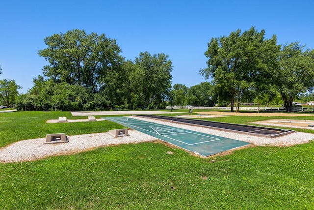 64 Big Musky Circle Ln, Wilmington, IL 60481 - view of home's community featuring shuffleboard, a lawn, and view of wooded area