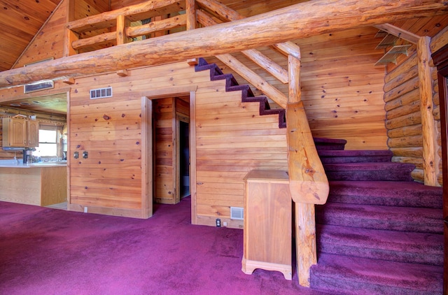 64 Big Musky Circle Ln, Wilmington, IL 60481 - stairs with wooden ceiling, wood walls, carpet floors, and vaulted ceiling