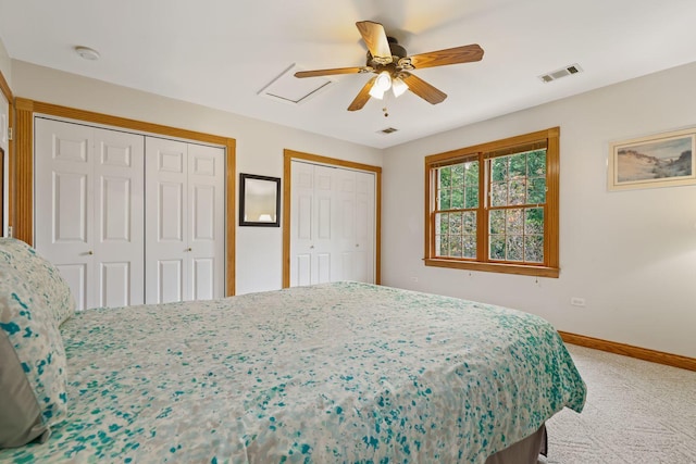 3048 Brampton Ln, Dyer, IN 46311 - carpeted bedroom with two closets, baseboards, and ceiling fan