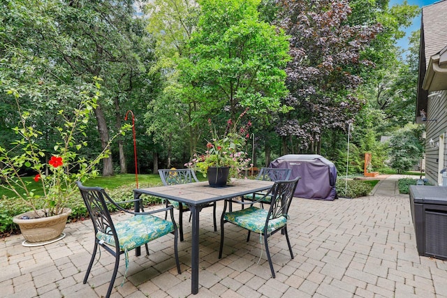 3048 Brampton Ln, Dyer, IN 46311 - view of patio featuring outdoor dining space and a grill