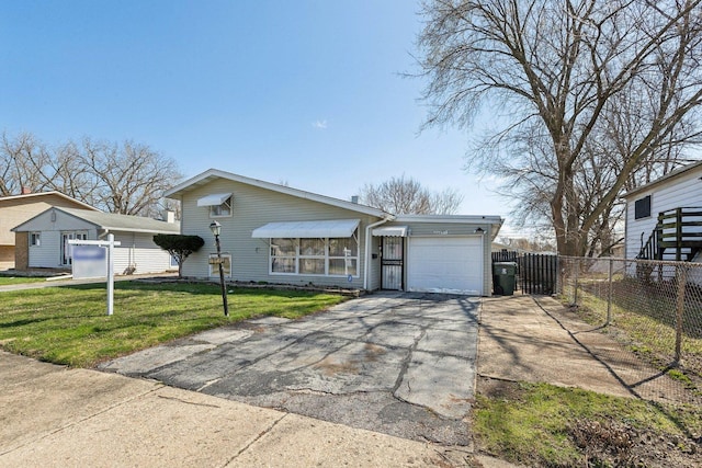 16641 Honore Ave, Markham, IL 60428 - single story home featuring an attached garage, fence, a front lawn, and aphalt driveway