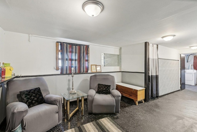 16641 Honore Ave, Markham, IL 60428 - living area with washer / clothes dryer and concrete floors