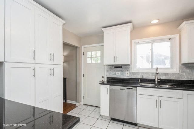 318 N Oaklawn Ave, Elmhurst, IL 60126 - kitchen with dishwasher, a sink, white cabinets, tasteful backsplash, and dark stone countertops