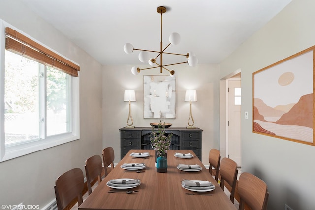 318 N Oaklawn Ave, Elmhurst, IL 60126 - dining room with a chandelier and healthy amount of natural light