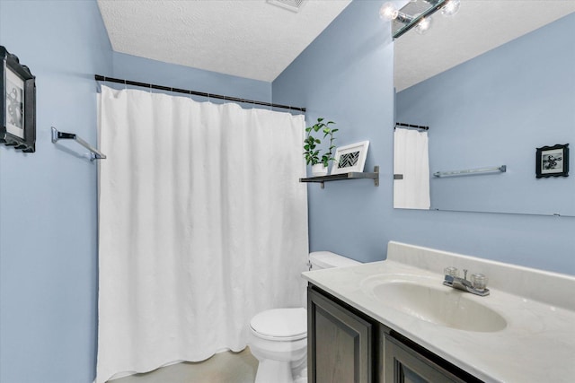 2203 E Pennsylvania Ave, Urbana, IL 61802 - full bathroom featuring toilet, a textured ceiling, vanity, and a shower with curtain
