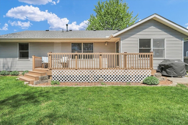 2203 E Pennsylvania Ave, Urbana, IL 61802 - back of property featuring a deck, a yard, and roof with shingles