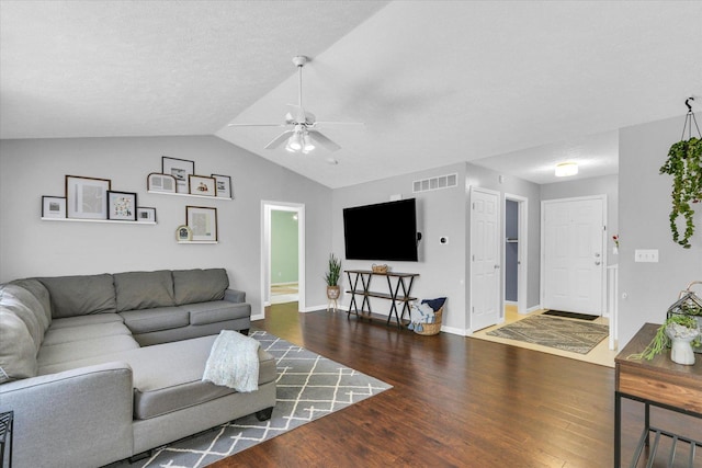 2203 E Pennsylvania Ave, Urbana, IL 61802 - living room featuring a ceiling fan, wood finished floors, vaulted ceiling, and baseboards