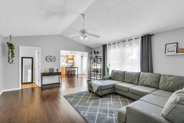 2203 E Pennsylvania Ave, Urbana, IL 61802 - living room with ceiling fan, lofted ceiling, wood finished floors, and a textured ceiling