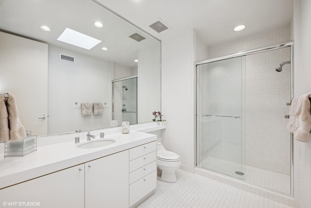 bathroom featuring a skylight, recessed lighting, visible vents, and a stall shower