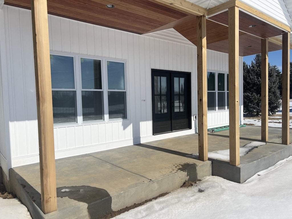 doorway to property featuring french doors and a patio area