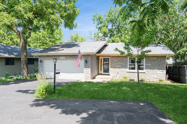 25W704 Jewell Rd, Wheaton, IL 60187 - ranch-style home with stone siding, driveway, and a garage