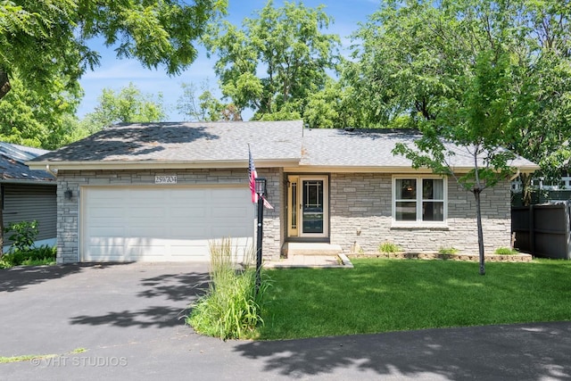 25W704 Jewell Rd, Wheaton, IL 60187 - ranch-style house featuring stone siding, an attached garage, asphalt driveway, a front lawn, and a shingled roof