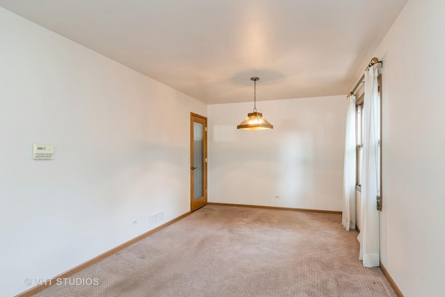 25W704 Jewell Rd, Wheaton, IL 60187 - unfurnished room with light carpet and baseboards