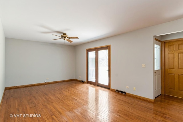 25W704 Jewell Rd, Wheaton, IL 60187 - unfurnished room with light wood finished floors and ceiling fan