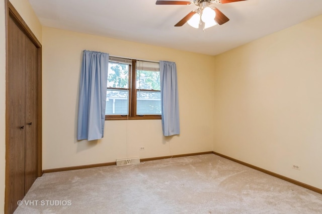 25W704 Jewell Rd, Wheaton, IL 60187 - unfurnished bedroom with carpet floors, a closet, and a ceiling fan