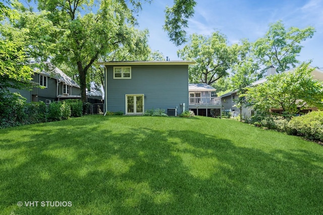 25W704 Jewell Rd, Wheaton, IL 60187 - rear view of property with a lawn