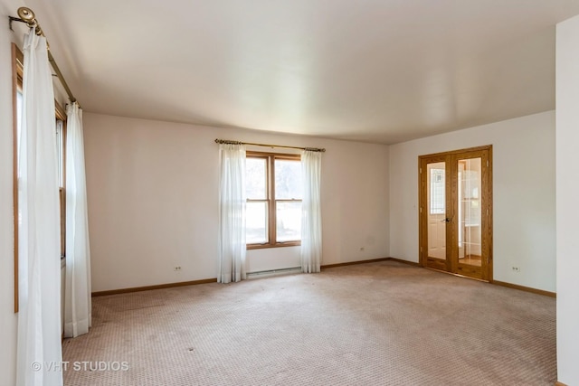 25W704 Jewell Rd, Wheaton, IL 60187 - carpeted spare room featuring french doors and a baseboard radiator
