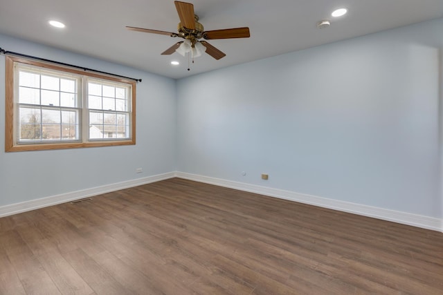 1165 Mayfield Ln, Hoffman Estates, IL 60169 - unfurnished room featuring dark wood finished floors, recessed lighting, baseboards, and ceiling fan