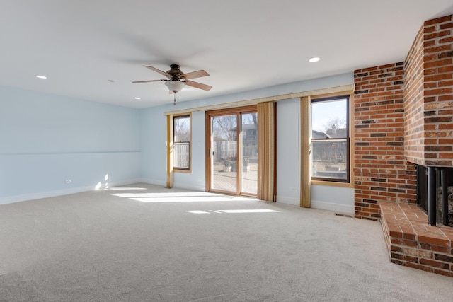 1165 Mayfield Ln, Hoffman Estates, IL 60169 - unfurnished living room with a ceiling fan, baseboards, carpet floors, recessed lighting, and a brick fireplace