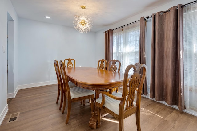 1165 Mayfield Ln, Hoffman Estates, IL 60169 - dining space with baseboards, visible vents, light wood finished floors, recessed lighting, and a chandelier