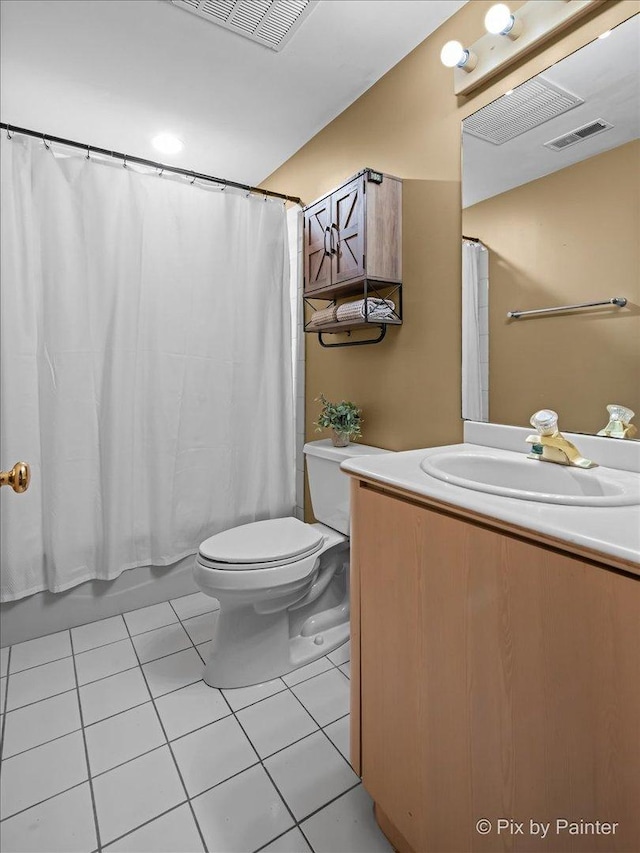 full bath with toilet, visible vents, tile patterned flooring, and vanity