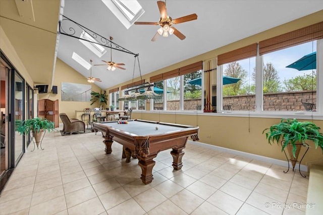 rec room with ceiling fan, baseboards, billiards, light tile patterned floors, and a skylight