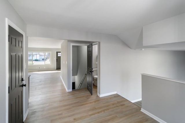 15439 Cherry St, South Holland, IL 60473 - corridor with light wood finished floors, baseboards, an upstairs landing, and lofted ceiling