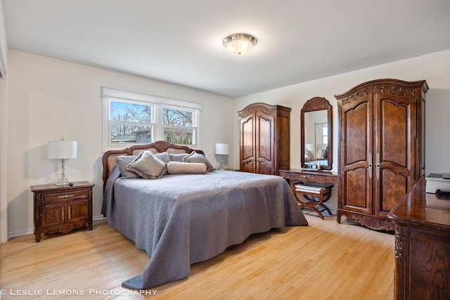 bedroom with light wood finished floors