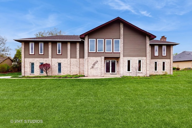 17N560 Hidden Hills Trl, Dundee, IL 60118 - back of house with a chimney, a yard, and central AC