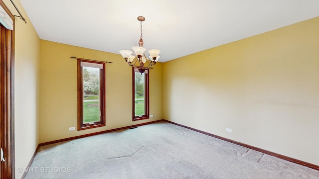 17N560 Hidden Hills Trl, Dundee, IL 60118 - empty room featuring an inviting chandelier, carpet flooring, baseboards, and visible vents