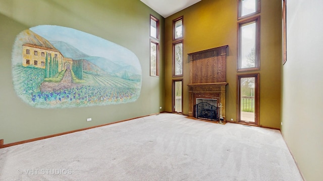 17N560 Hidden Hills Trl, Dundee, IL 60118 - unfurnished living room featuring stairs, carpet, baseboards, and a high ceiling